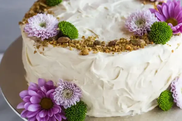 Pistachio and cardamom cake with whipped white chocolate ganache